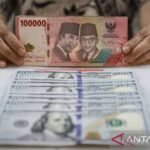 Rupiah bergerak fluktuatif seiring laporan beragam dari Timur Tengah